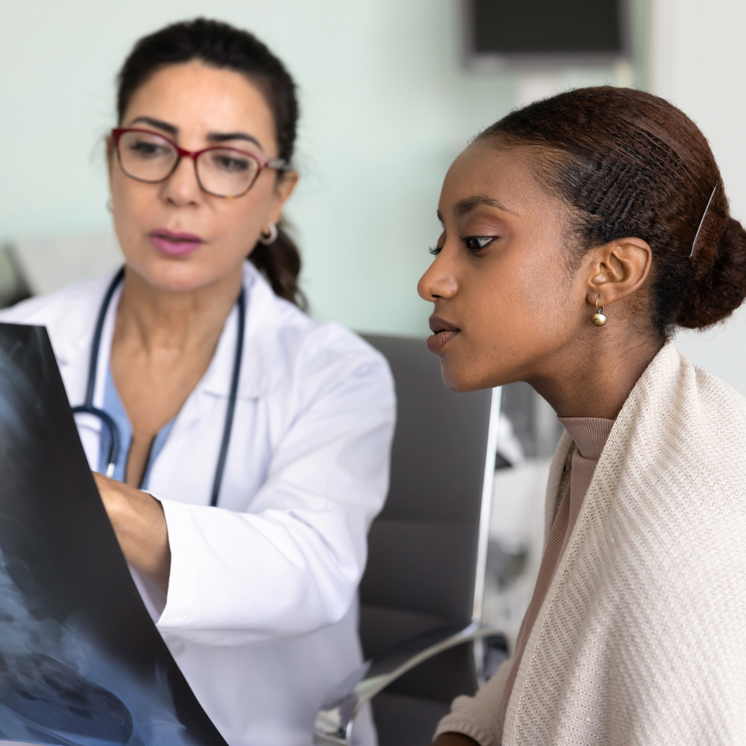 Provider reviewing scan with patient